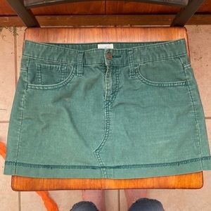 Levi’s green corduroy miniskirt.
